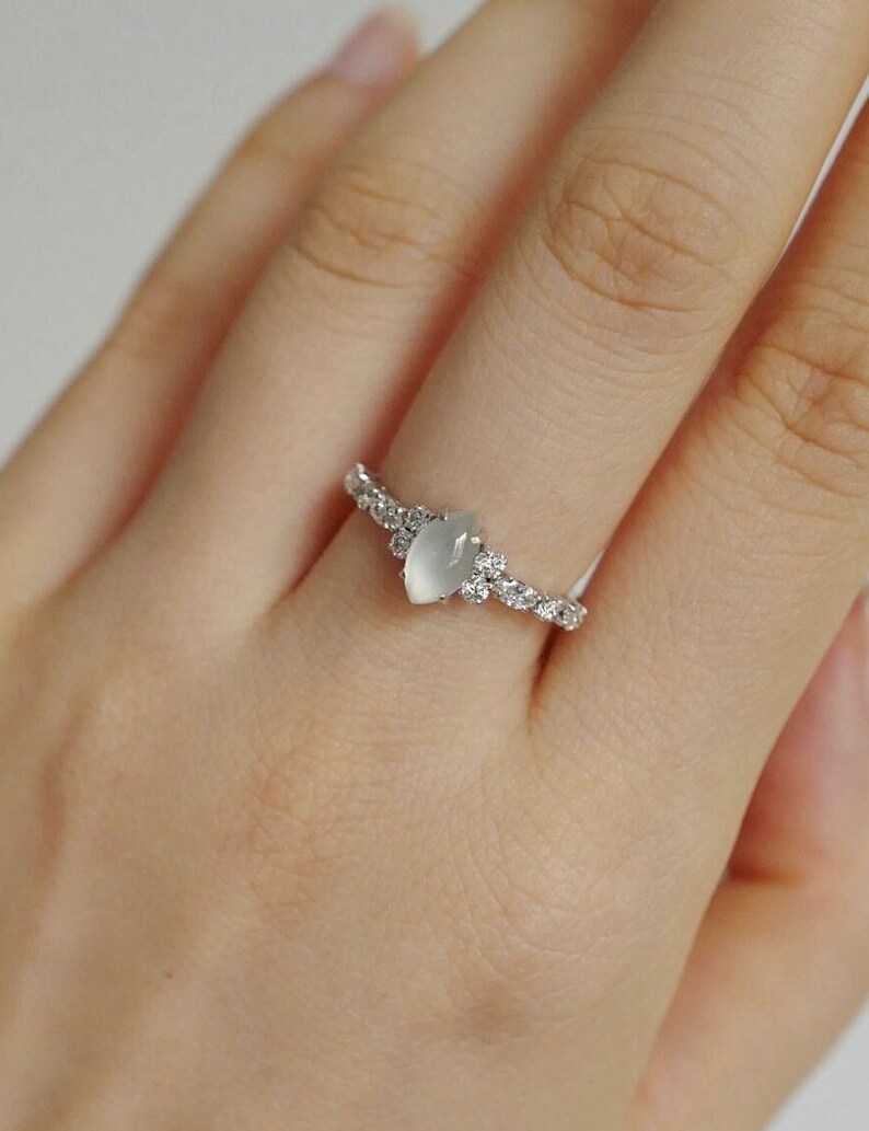 white jade ring, marquise jade ring, white jade engagement ring, unique engagement ring, unique diamond ring, lab diamond ring, lab grown diamond ring, moissanite ring, moissanite jewelry, best lab diamond jewelry, lab diamond near me