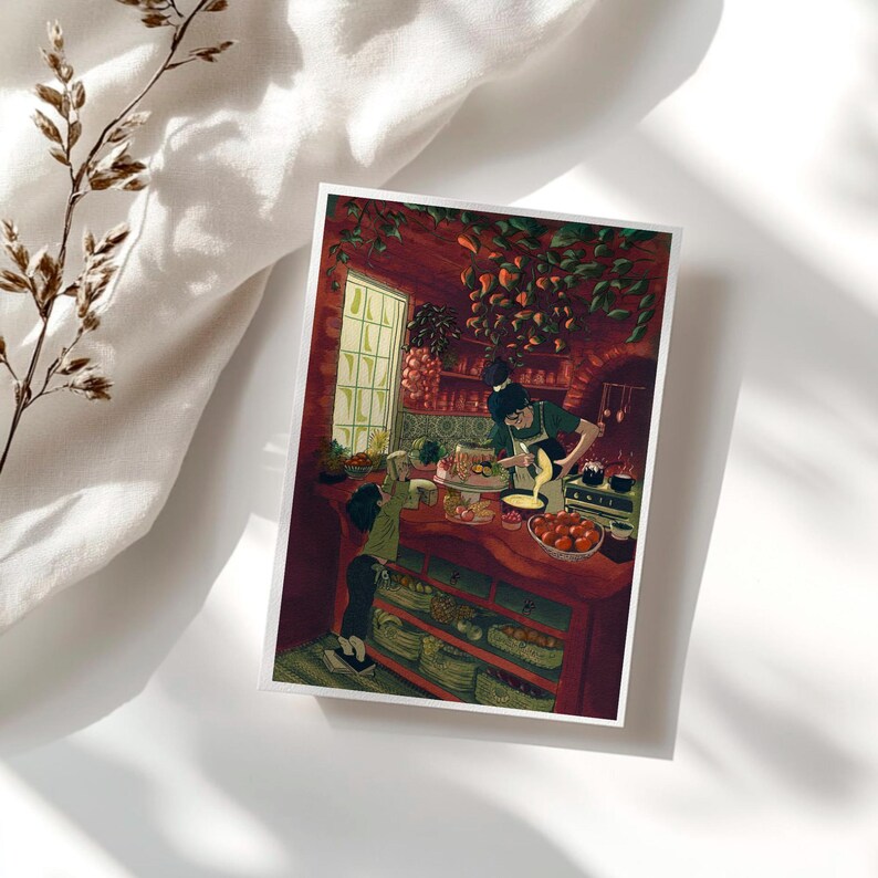 May include: A print of a kitchen scene with two people cooking. The kitchen is red with a window and shelves filled with food. One person is pouring something into a bowl, while the other looks on. The print is on a white background.