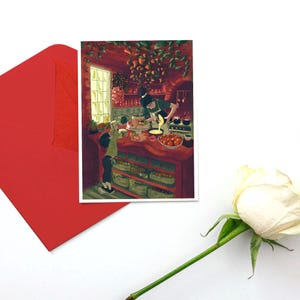 May include: A greeting card featuring an illustration of a kitchen scene with two people. One is pouring liquid onto a cake, while another looks on. The card is accompanied by a red envelope and a white rose.