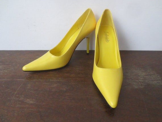 Bloom into spring with bright yellow! | Heels, Beautiful shoes, Stiletto  heels