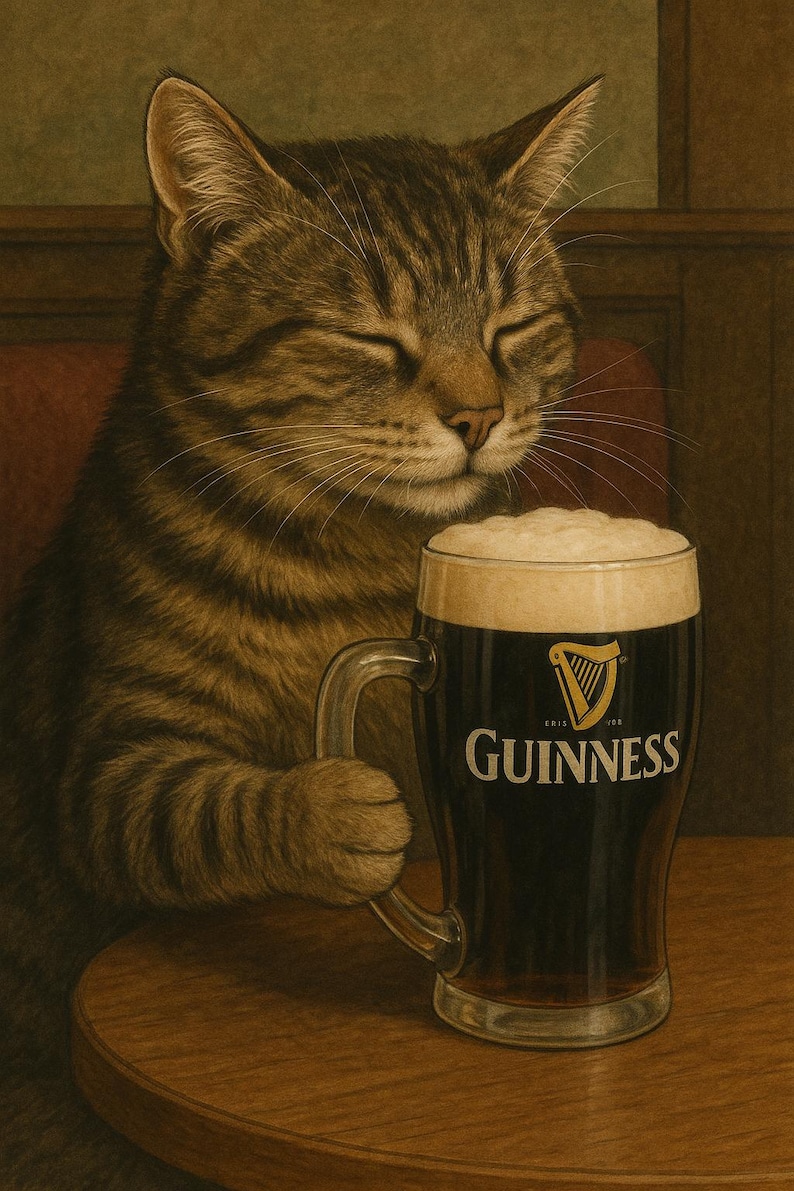 May include: A brown tabby cat with closed eyes sits at a table, holding a glass of Guinness beer with one paw.