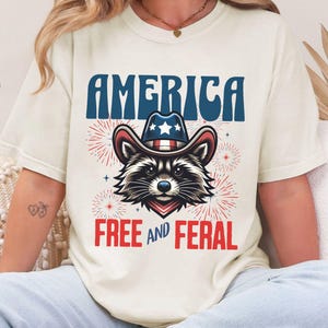 Chemise America, chemise patriotique de raton laveur, T-shirt de cow-boy occidental, T-shirt pour femme fête du Travail, chemise 4 juillet, haut Memorial Day, T-shirt Animal USA