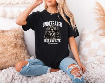 Undefeated Hide And Seek Champion Shirt, Funny Bigfoot Tee, Sasquatch Humor Tshirt, Camping Graphic Shirt, Bigfoot Lover Tee, Retro Tee