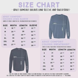 The image is a size chart for an adult comfort colors long sleeve and sweatshirt. It provides measurements for different sizes, including S, M, L, XL, 2XL, and 3XL. The chart also includes a section for an adult comfort colors sweatshirt, which is measured in inches. The chart is designed to help customers determine the appropriate size for their preferred style of clothing.