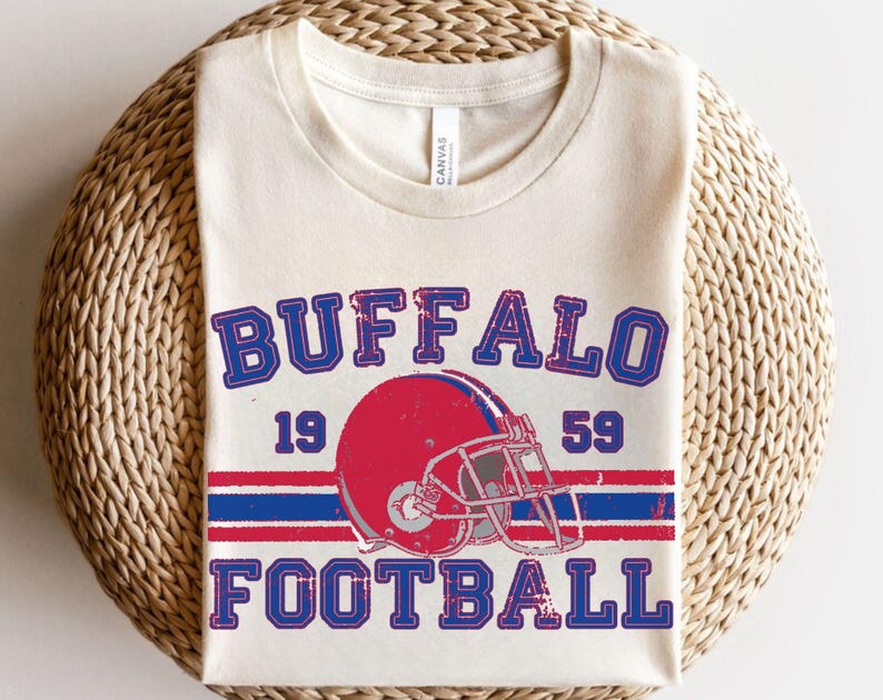 a buffalo football t - shirt on a wicker basket