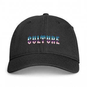 May include: A black baseball cap featuring the word CULTURE embroidered in a stylized, gothic-inspired font across the front. The lettering displays a gradient color effect, transitioning from blue at the top to purple and light pink at the bottom.