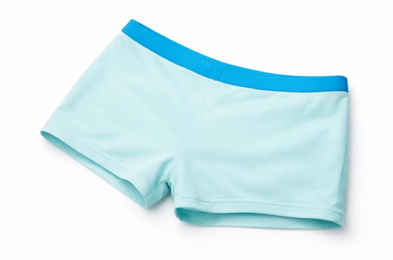 May include: Light blue shorts with a contrasting bright blue waistband. The shorts are made of a smooth, likely synthetic fabric. The garment is designed for comfort and activity.