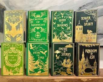 Throne of Glass Series - Rebinding with book leather. Gold sprayed edges, gold ribbon bookmarks.