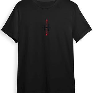 A black t-shirt with a red graphic design on the front.