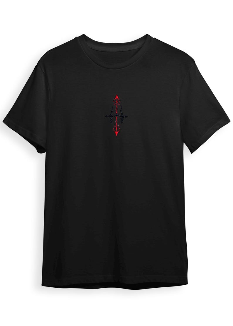 A black t-shirt with a red graphic design on the front.