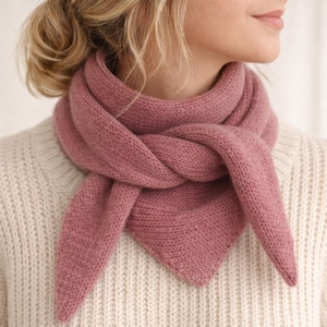 May include: A set of three ceramic mugs with a speckled, matte finish in cream, light brown, and dark brown. Each mug features a minimalist design, ideal for tea or coffee.