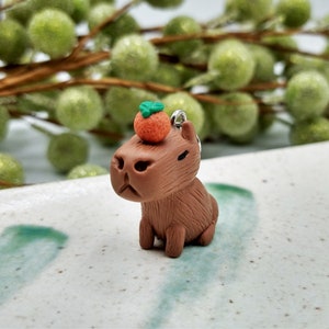 Capybara with Mandarin Orange on Head, Handmade Polymer Clay Charm, Keychain, Necklace, or Charm Strap