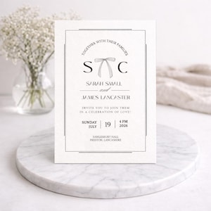 May include: A wedding invitation with a minimalist design. The invitation features the names Sarah Small and James Lancaster, along with the date and time of the ceremony. The text is in black on a white background, with a decorative bow and the initials "S" and "C".