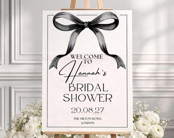 Modèle de plaque de bienvenue Coquette avec noeud noir pour la douche nuptiale Toile éditable | Élégante plaque de bienvenue pour mariage Plaque de mariée minimaliste imprimable