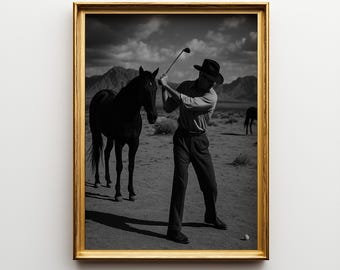 May include: Black and white framed print featuring a man swinging a golf club on a desert landscape, with a black horse standing nearby. The print has a gold frame and the text "Ompie Printable" at the bottom.