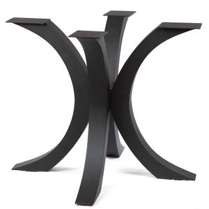 May include: Black metal table base with a unique, curved design. The base features five arching legs that meet in the center, with flat mounting plates at the top. The legs are a matte black finish, suitable for a modern or industrial aesthetic.