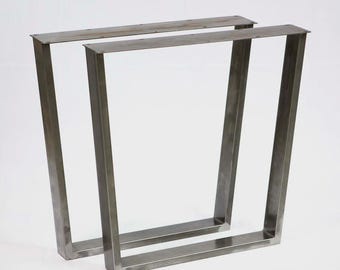 Mesa de comedor de 28" de alto, patas trapezoidales, superficie ancha