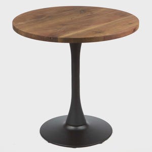 May include: A round side table with a natural wood top and a dark brown, tulip-shaped base. The table's top is approximately 24 inches in diameter, and the overall height is about 20 inches.