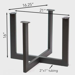May include: Black metal table base with a cross-shaped design. The base is 16 inches high, 21 inches wide, and 16.25 inches deep. The tubing is 2" x 1".
