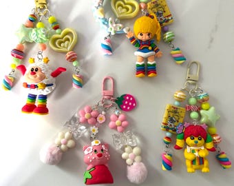 Llavero con cuentas de Rainbow Brite y sus amigos – Accesorio colorido y kawaii para bolsos