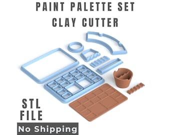 Puede incluir: Un conjunto de cortadores de arcilla con forma de paleta de pintura, que incluye piezas de plástico azul claro, un marco rectangular, una rejilla con varios compartimentos, una placa rectangular marrón y un vaso marrón. Texto: PAINT PALETTE SET CLAY CUTTER.