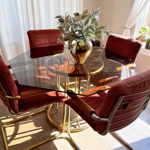 Local Pickup Only | Vintage 1970s - 1980s Smoke Glass Octogon Dining Table | 4 Brass Cantilever Burgundy Chairs