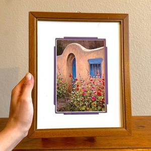 Southwestern “Adobe Gate” Hollyhock Floral Oil Painting Print & Home Artwork | Framed 1990s Western Art Decor