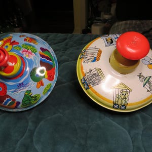 2 Vintage Tin top Lithograph Children&#39;s Spinning Tops Ohio Art Plus Another Working