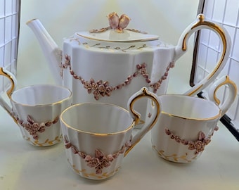 Pink And Cream Tea Service With Teapot And Cups