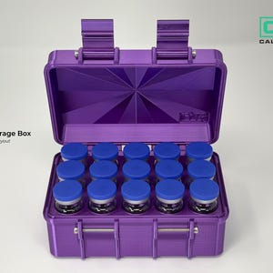 May include: A purple 15-vial storage box with a 3x5 layout, featuring a hinged lid and two latches. The box contains fifteen clear glass vials with blue caps. Text on the image reads 15-Vial Storage Box 3x5 Layout and CVX CALVORAX.