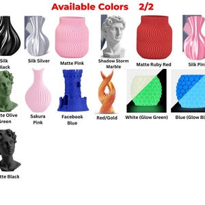 May include: A display of various 3D-printed decorative items in multiple colors. The items include vases, busts, and abstract shapes. Colors range from black, silver, and pink to green, blue, and red. The text "Available Colors 2/2" is at the top.