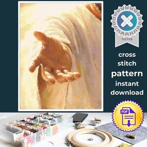 May include: A cross stitch pattern instant download featuring a digital illustration of an outstretched hand in warm golden tones. The image includes a blue and white tested badge and the text cross stitch pattern instant download.