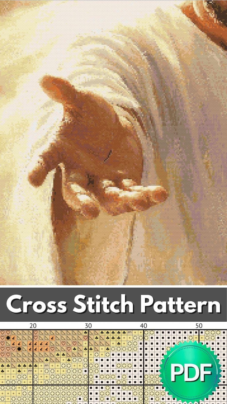 May include: A cross stitch pattern featuring a digital illustration of an outstretched hand with a bright, glowing background. The lower section displays a grid with various symbols and a green circular badge containing the text PDF.