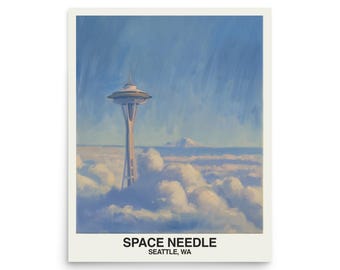 May include: A print of the Space Needle in Seattle, Washington, rising above the clouds. The artwork features a light blue sky and a mountain in the background. The text "SPACE NEEDLE SEATTLE, WA" is printed at the bottom.