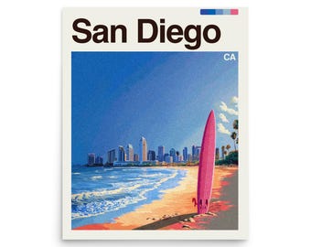 May include: A poster with the words "San Diego" in large, bold letters. The image features a pink surfboard on a sandy beach with the city skyline in the background under a blue sky. The word "CA" is in the upper right corner.
