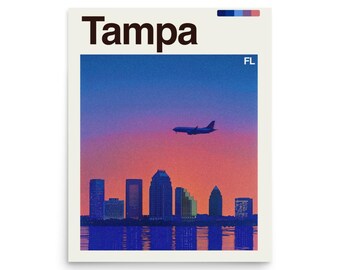 May include: Poster featuring the word "Tampa" in bold black letters above a colorful sunset scene. A silhouette of a plane flies over the city skyline, with the letters "FL" in the upper right corner. The image has a retro, travel-poster aesthetic.