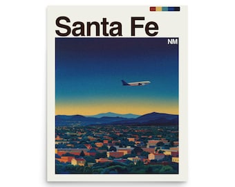 May include: A poster featuring a stylized illustration of Santa Fe, New Mexico. The artwork depicts a cityscape with mountains in the background and a plane in the sky. The words "Santa Fe" are at the top.