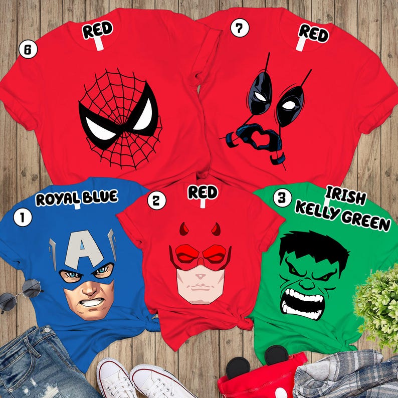 a collection of five t-shirts with different superhero and comic book character designs, including Spider-Man, Deadpool, Captain America, the Hulk, and Kelly Green.