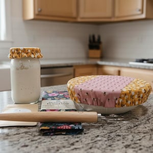 May include: A set of three ceramic mugs with a speckled, matte finish. The mugs are in shades of blue, green, and white. Each mug has a simple, modern design, perfect for coffee or tea.