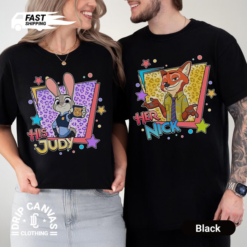 May include: Black t-shirts featuring cartoon characters Judy Hopps and Nick Wilde from Zootopia. The Judy shirt has the text "HIS JUDY" and the Nick shirt has the text "HER NICK". Both shirts have colorful star and geometric designs.