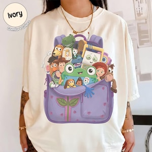 Camiseta retro de Disney Toy Story 5 con bolsa de juguetes, camiseta Lilypad Ts5 "Lo sabía", camiseta Pixar Fest Toystory Land Family Trip, atuendo para vacaciones en Disneyland Ivory/Sand/Natural