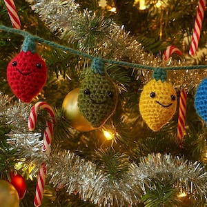 May include: A festive Christmas tree adorned with a garland of crocheted light bulb ornaments in red, green, yellow, and blue. The ornaments have smiling faces and are strung on a green cord. Candy canes and silver tinsel add to the holiday cheer.