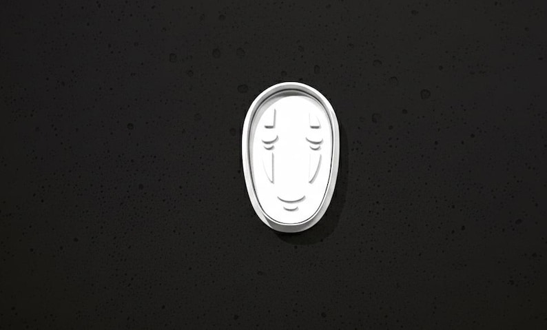 May include: A white, oval-shaped mask with a minimalist design, featuring two vertical lines for eyes and a curved line for a smile. The mask is set against a dark, textured background, creating a striking contrast.