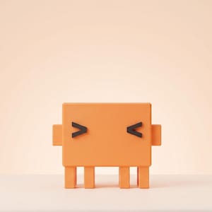 May include: A rectangular orange figurine with four short legs and two small side protrusions. The face features two black symbols resembling greater-than and less-than signs, positioned horizontally to represent closed eyes on the front surface.
