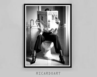 May include: Black and white framed print featuring a person seated on a toilet, reading a newspaper with the headline "CITY NEWS." The person is wearing a white shirt, black pants, and high heels. The print is signed "RICARDOART."