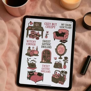 May include: A digital tablet displaying gothic-themed illustrations with text like "Cozy But Creepy" and "Sweet Gothic Dreams." The image includes a pink mug with coffee, a lit candle, and makeup. The overall theme is a cozy, witchy aesthetic.