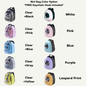 May include: A variety of mini pet carrier backpacks in different colors. The options include clear with black, white, clear with pink, pink, clear with blue, blue, clear with gray, purple, clear with yellow, and leopard print. The text "Mini Bag Color Option" and "FREE Keychain Hook Included" is also visible.