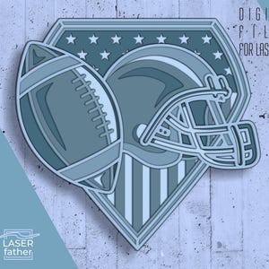 Pode incluir: Um gráfico em camadas, em tons de azul, com um design de futebol americano, capacete e escudo. O escudo tem estrelas e listras, com o texto "DIGITAL FILES FOR LASER CUT". A imagem também inclui abreviações de tipos de arquivo: SVG, CDR, DXF, AI, EPS e DWG.