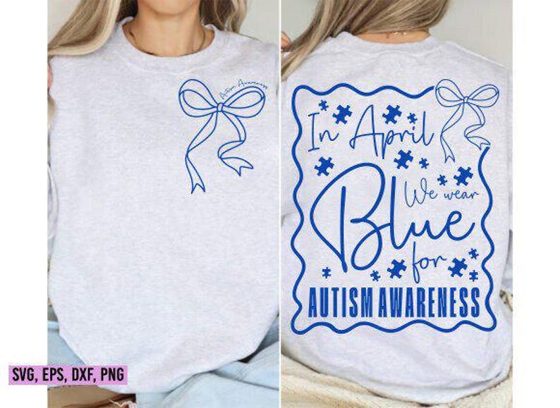 May include: Light gray sweatshirt with blue bow and text. Front features a bow and the words "Autism Awareness". Back has "In April We Wear Blue for Autism Awareness" in a blue puzzle-piece design.