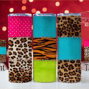 May include: Three stainless steel tumblers with unique designs. One has pink polka dots, leopard print, and a green base. The second has turquoise, tiger stripes, and a lime green base. The third has leopard print and turquoise. The word "Straight" and "Tapered" are visible.